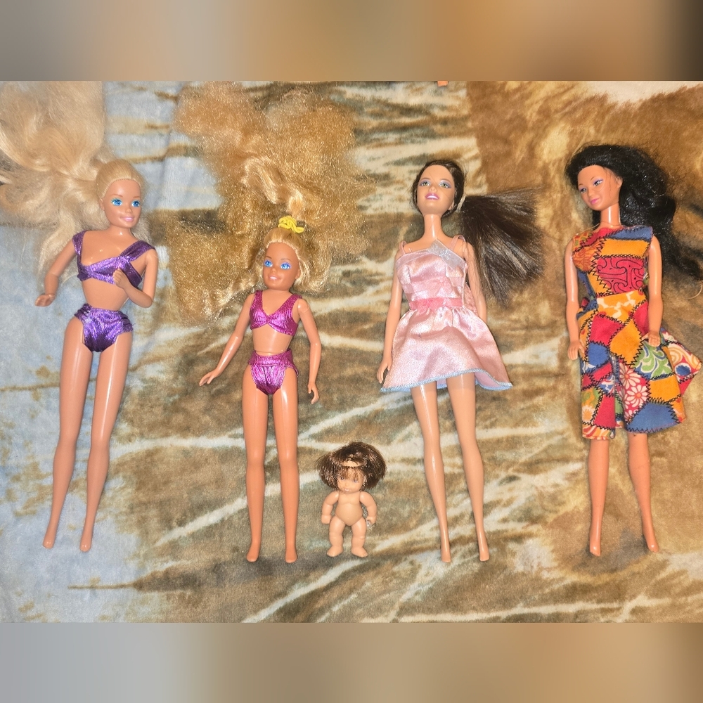 Lot of Vintage Fashion Dolls in Pink and Purple